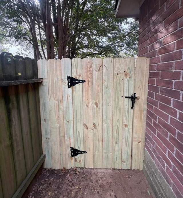 Wood gate built by Edel Contracting